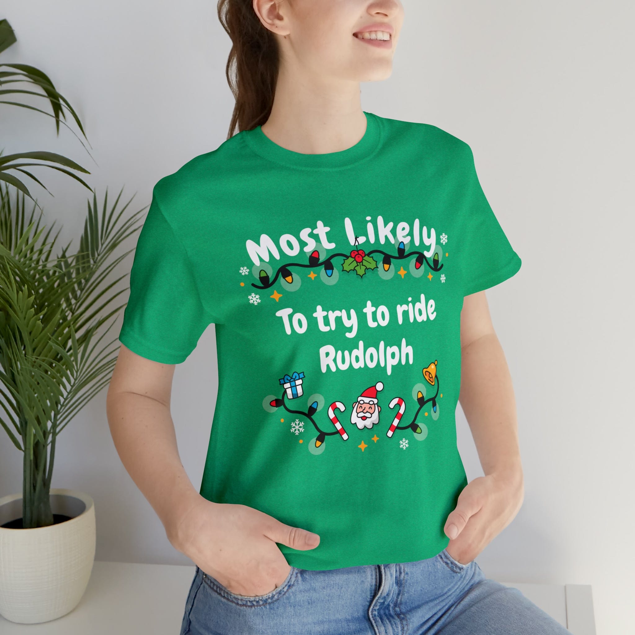 Most Likely To try To Ride Rudolph Unisex Deluxe Tee